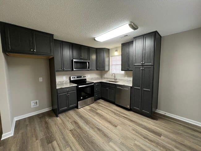Building Photo - 305 Rustic Rd  REDUCED $25 APPLICATION FEE