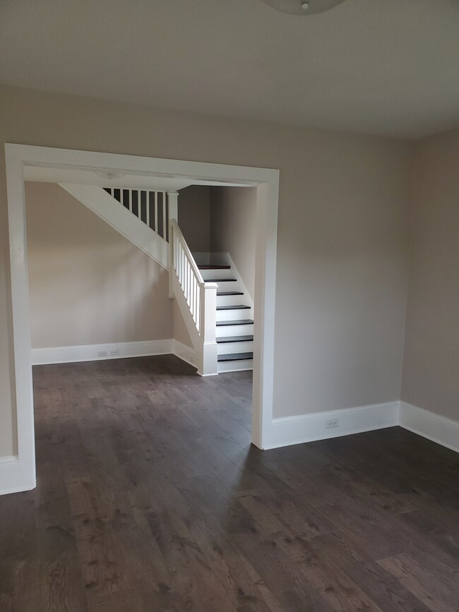 Living room looking into dining room - 507 Dewart St
