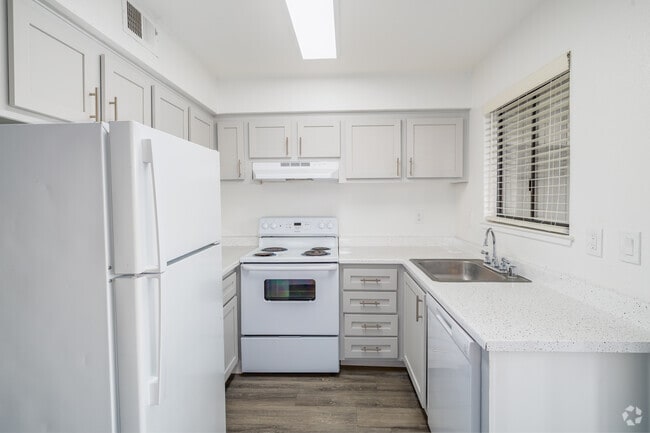 Downstairs 2BR, 1BA - 653SF - Kitchen - Courtyard Cottages
