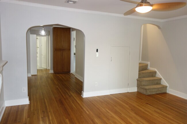 Living room looking into Dining Room and Stairs on the right to upstairs bedroom - 2239 E 18th St