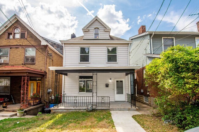 Building Photo - FULLY RENOVATED 4 BEDROOM BEAUTY IN MOUNT ...
