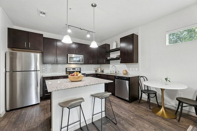 Spacious and modern kitchen with ample storage - Highline Apartments
