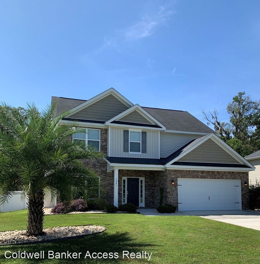 Foto principal - 4 br, 2.5 bath House - 1061 Woodland Dr.