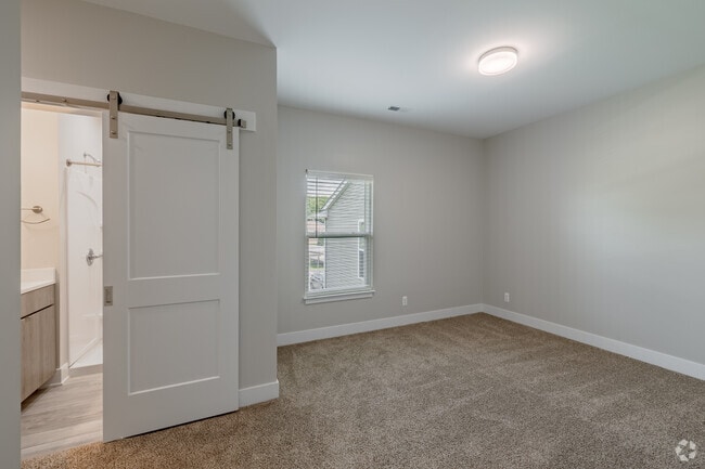 2BR, 2BA - 836SF - Primary Bedroom - Northridge Meadow Apartments
