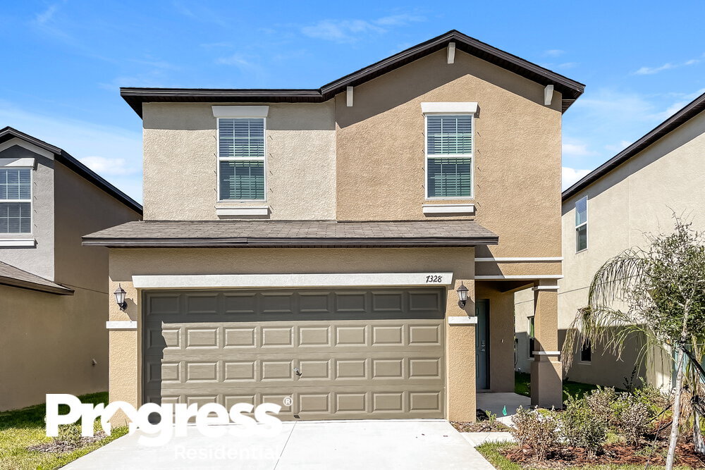 7328 Spring Snowflake Ave, Palm RiverClair Mel, FL 33619 House