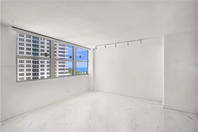 Building Photo - 5055 Collins Ave