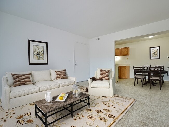 Spacious living room at Charter Oak Apartments, Davison, Michigan - Charter Oaks Apartments