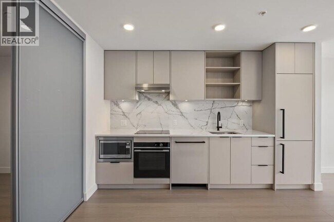 Photo du bâtiment - 422-422 E 3rd St