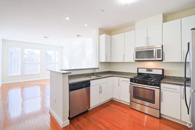 1BR, 1BA - 686SF - Kitchen & Living Room - The Box District