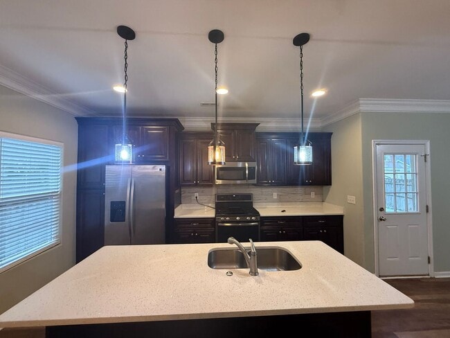 Building Photo - Stunning Move-In Ready 4BR Corner Home "ASK ABOUT OUR ZERO DEPOSIT"