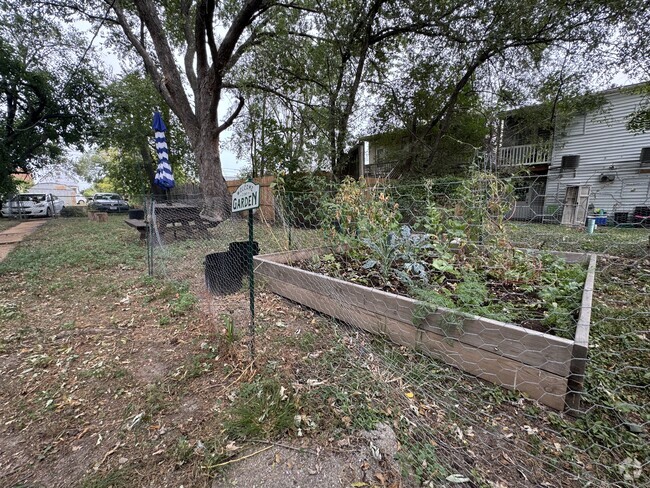 Community garden bed, available for any of the residents to use. - 5313 Magnolia Ave