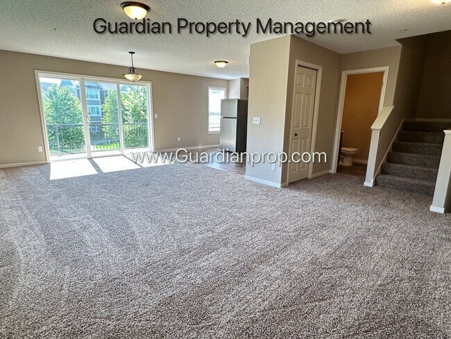 Building Photo - Champlin Corner Unit Town Home, 2 Car Garage, Dishwasher, Washer/Dryer, Balcony