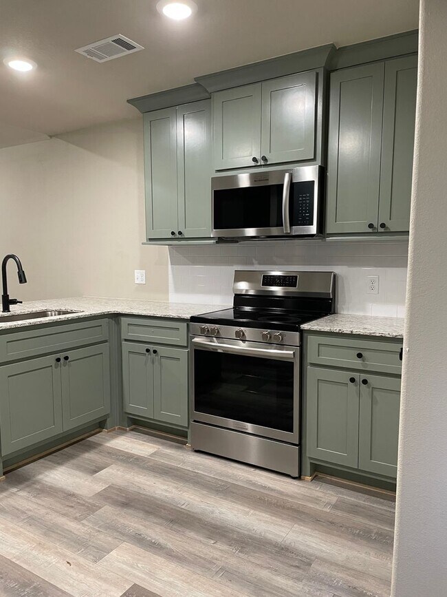 Building Photo - Three Bed/Two Bath Home---Ask about the mo...