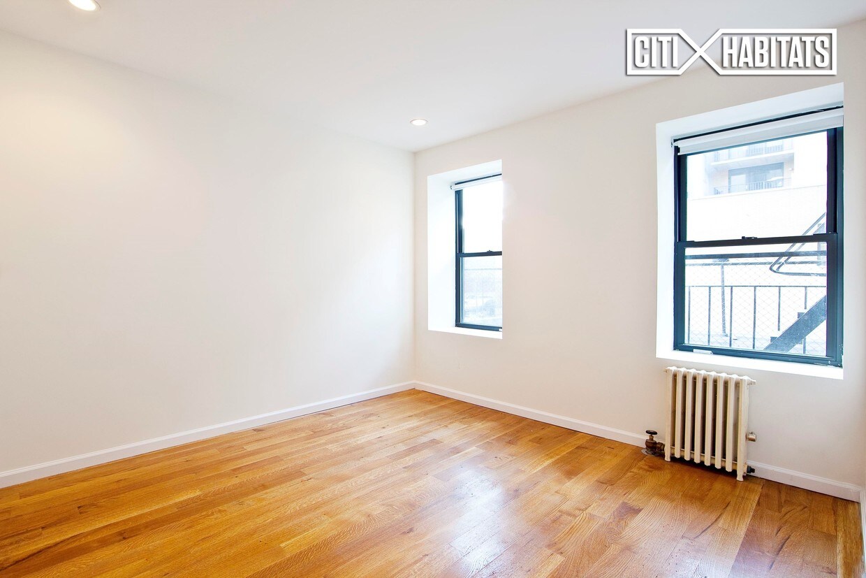 Foto del edificio - 9 E 118th St