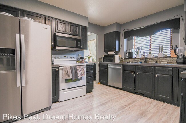 Building Photo - 4 br, 3.5 bath House - 6185 Northwind Drive