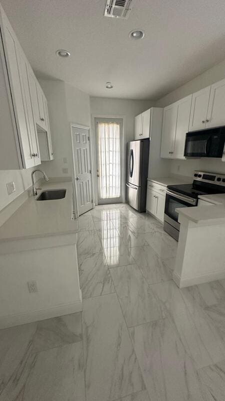 Building Photo - 9189 Camden Gardens St