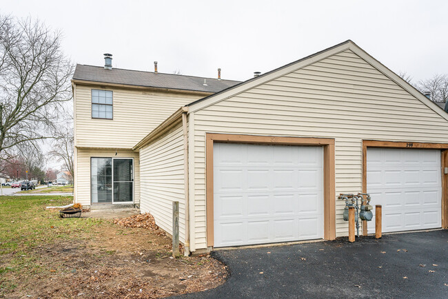 Exterior - Backyard with Patio and Garage - 301 Cross Country Dr S