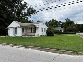 Building Photo - 1357 S Florence Ave