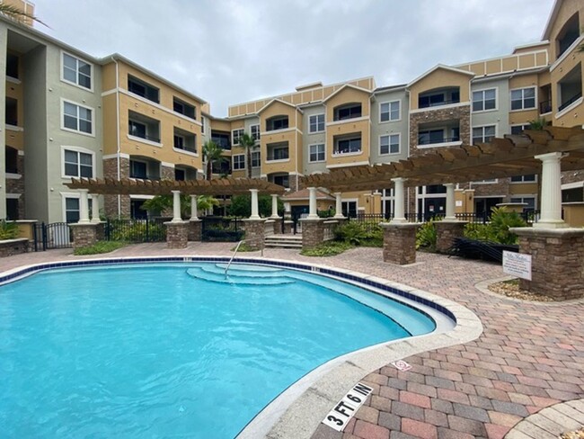 Building Photo - Condo in Villa Medici, ready now!