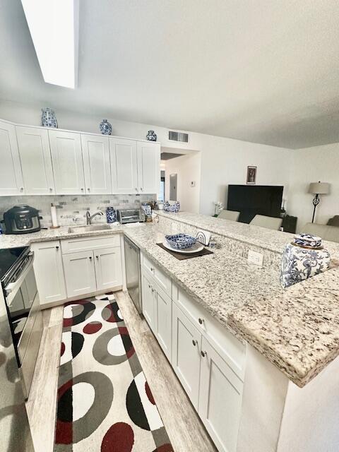 Building Photo - 209 Brighton E