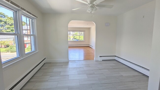 View from open Dining To Living Room Large Bright Picture Windows - 852 Smith St