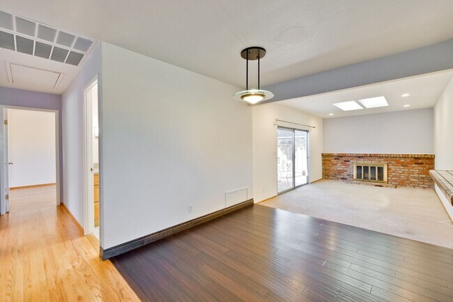 Building Photo - Newly Landscaped Backyard- Hardwood Floors...