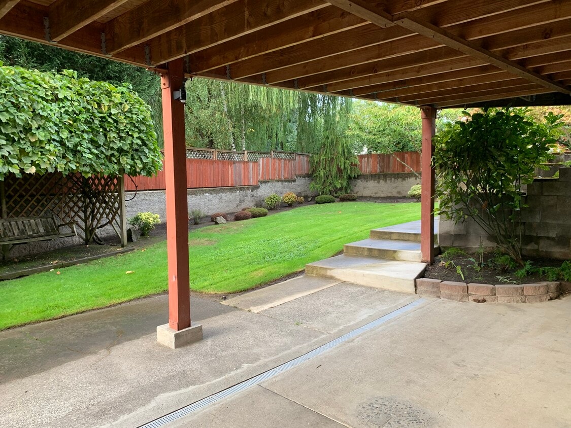 Backyard entrance to daylight basement - 4135 NW Carlton Ct
