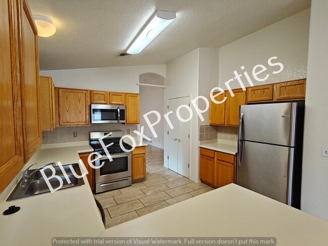 Building Photo - 10211 E Paseo Juan Tabo