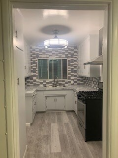 Water proof floor, Marble and glass tile - 5335 Whitsett Ave