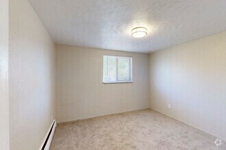 2BR, 2BA - 750SF - Bedroom 2 - Alpine Flats