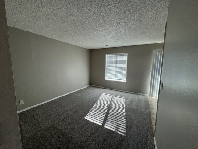 Building Photo - Fully Remodeled 3 Bedroom Townhome Available Soon!