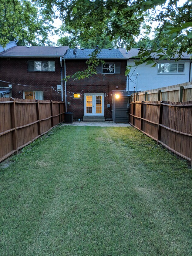fenced-in backyard and patio - 715 Joseph Ave.