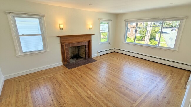 Handsome Fireplace Detail w/Sconces Large Windows Front Yard View - 852 Smith St