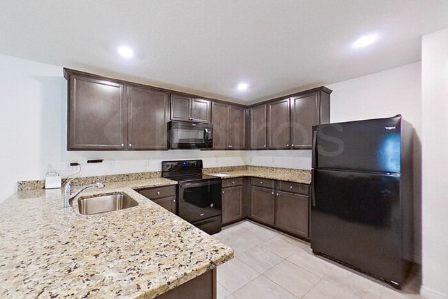 Foto del edificio - 8460 Indian Laurel Ln