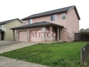 Building Photo - 702-704 N Cloverleaf Loop