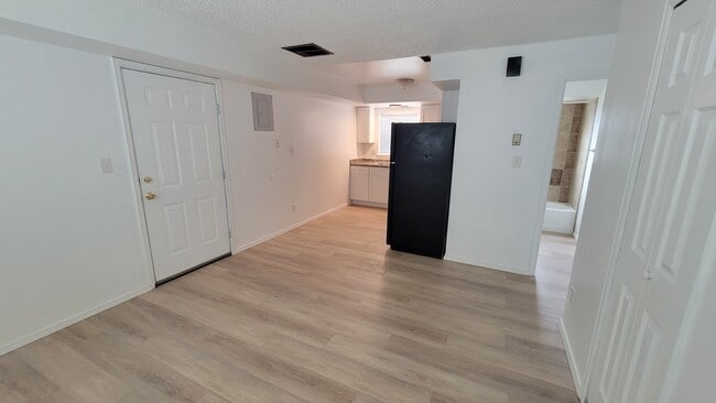 Kitchen from LIving room new LVP flooring - 6640 Provincial Dr
