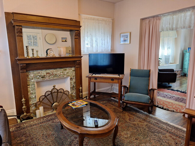 Front room with fireplace - 4420 Troost Ave