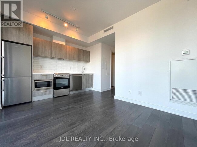 Building Photo - 50 Charles St E