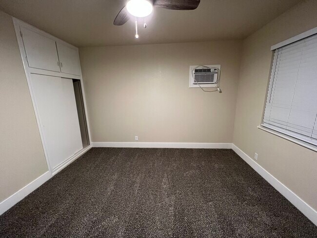 Master bedroom w/wall a/c - 536 N Gertrude Ave