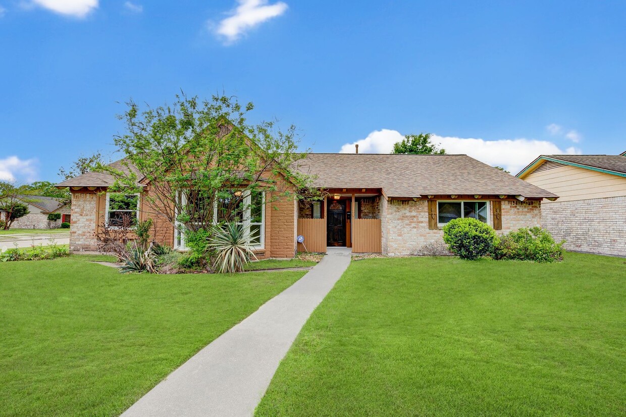 Primary Photo - One-story home nestled on a corner lot. 3 ...