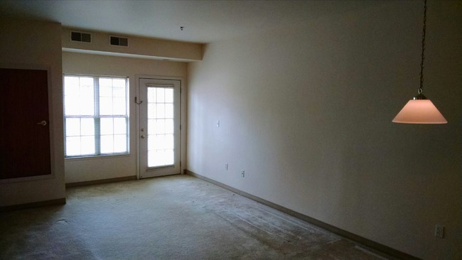 Living Room/Walk out to patio or deck - West Manor Senior Apartments