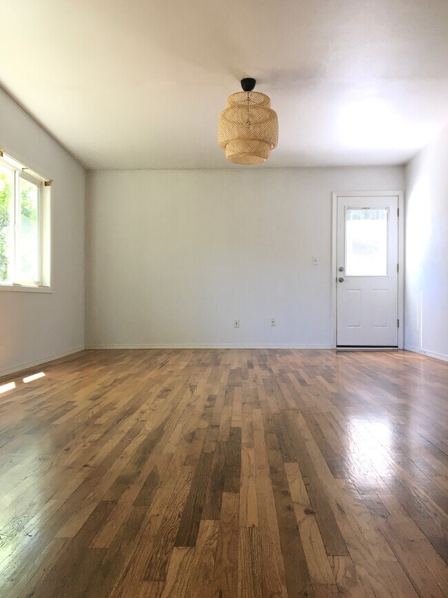Living room and backdoor - 5427 SE Tibbetts St