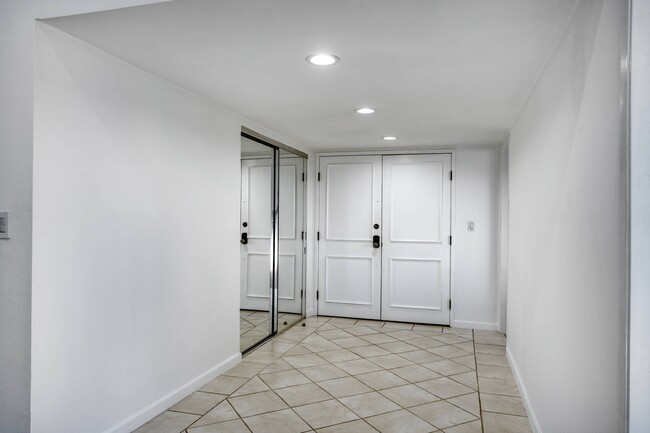 Entry w/ Double Doors and closet - 5325 Lindley Ave