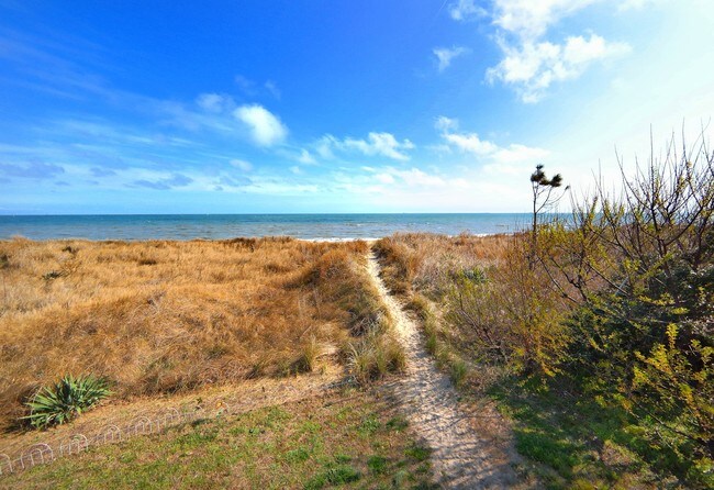 View of the beach from the two end units of this property. - 1424 E Ocean View Ave