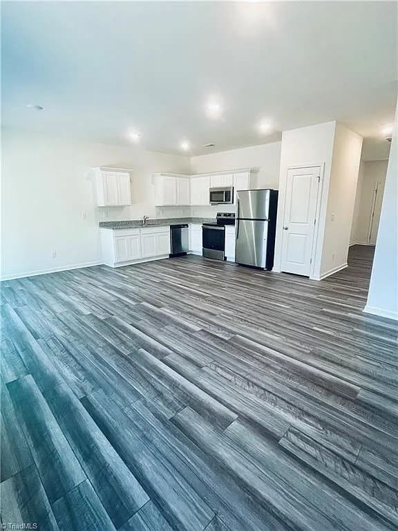 Building Photo - Earn Wealth While Leasing - Like a Homeown...