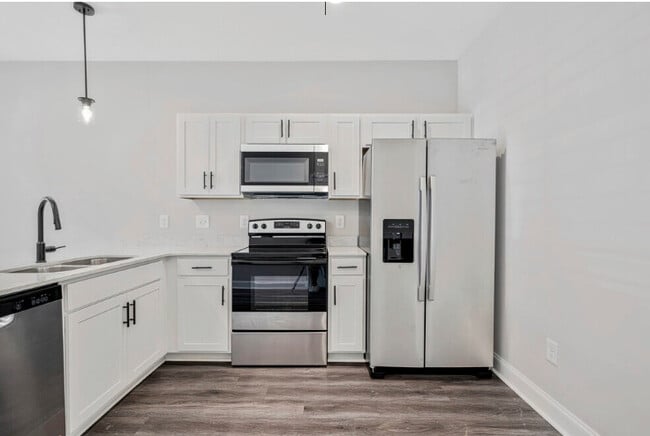 Building Photo - Discover Modern Living at Needmore Creek T...