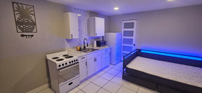 Foto del edificio - 1448 W 31st St