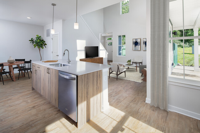 Upgrade Scheme townhome kitchen, dining, and living areas with hard surface flooring - Avalon Old Bridge