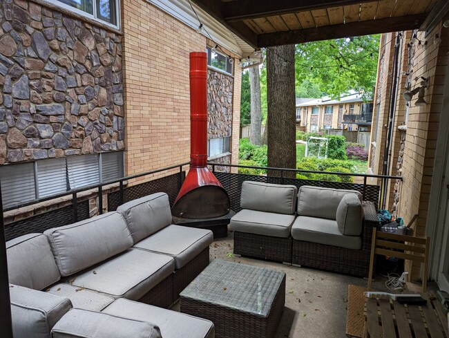 The outdoor patio is wonderfully spacious and flows right into the dining area. - 115 Biscayne Dr NW