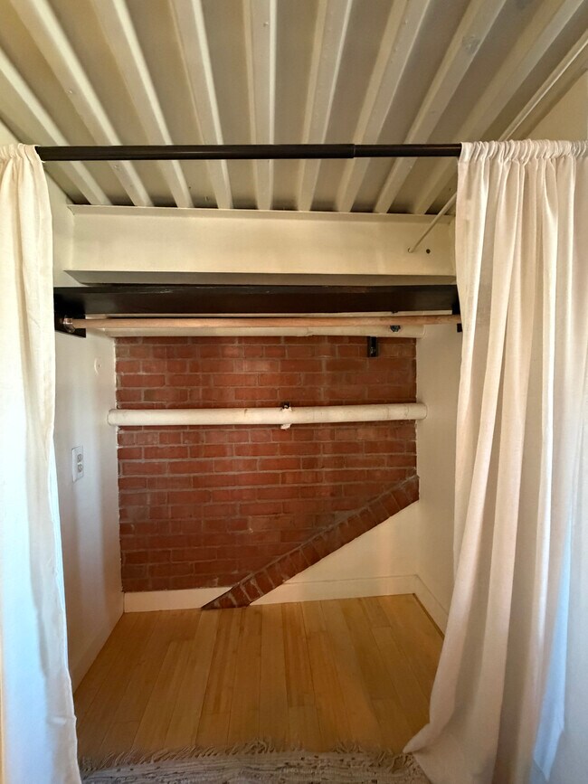 Upstairs Closet with rod - 300 Tijeras Ave NE